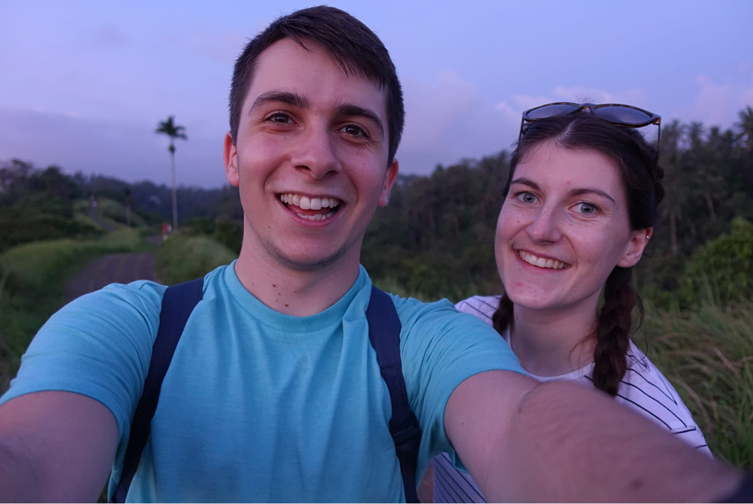 Couple on an early trip together in Ubud Bali in 2017 surrounded by tropical greenery